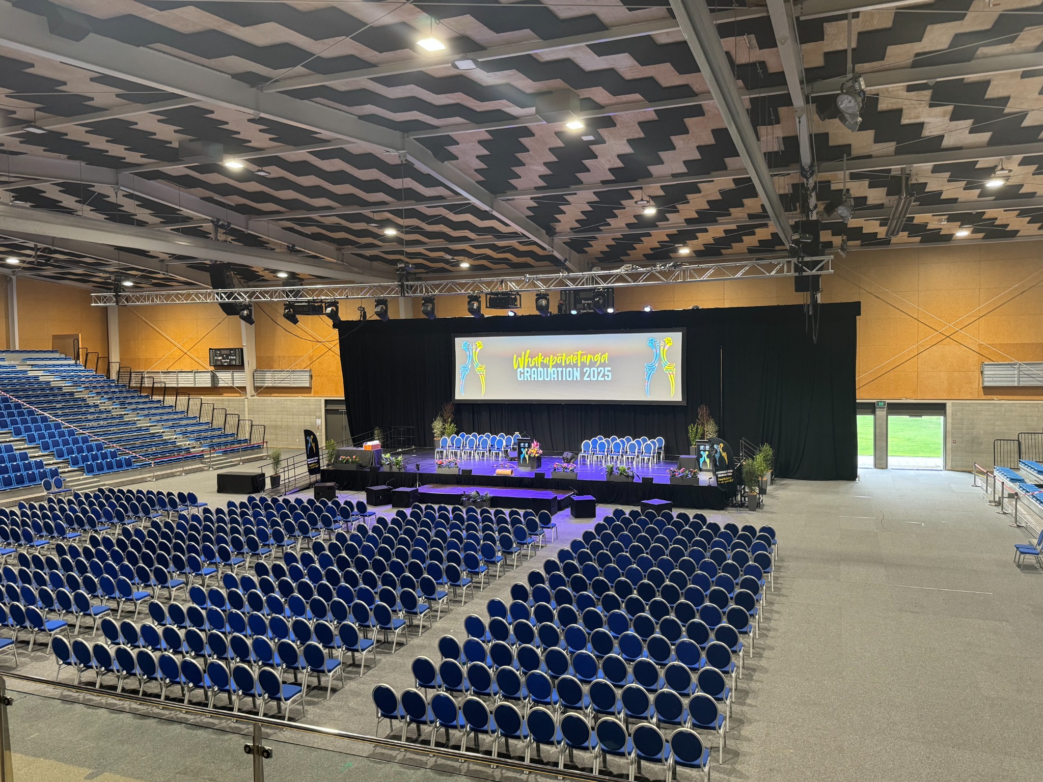Whakapōtaetanga graduation venue set with stage and audience seating